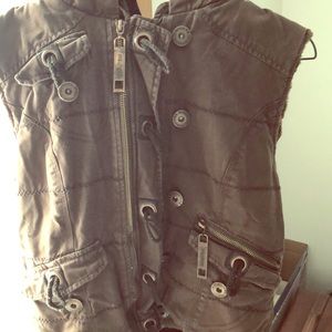 Dark brown, hooded, zip-up vest.